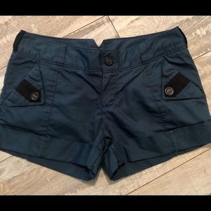 The north face size 4 teal colored cuffed shorts